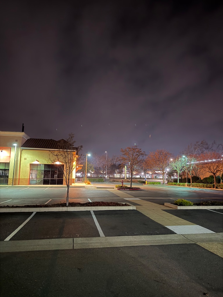 Parking lot maintenance and cleaning in Santa Clara CA — commercial lot by Deluxe Building Services