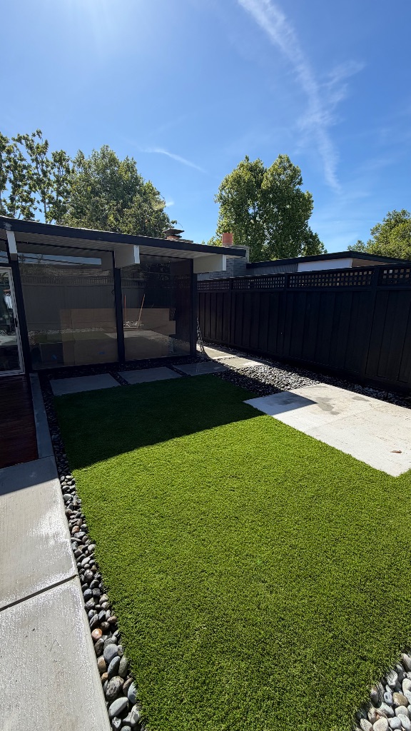 Synthetic turf installation in Santa Clara CA — backyard by Deluxe Building Services
